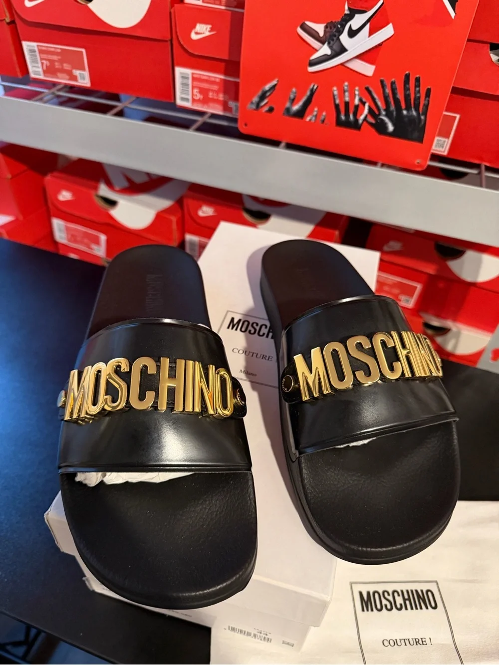 Moschino Black Slides with Gold Logo Plaque